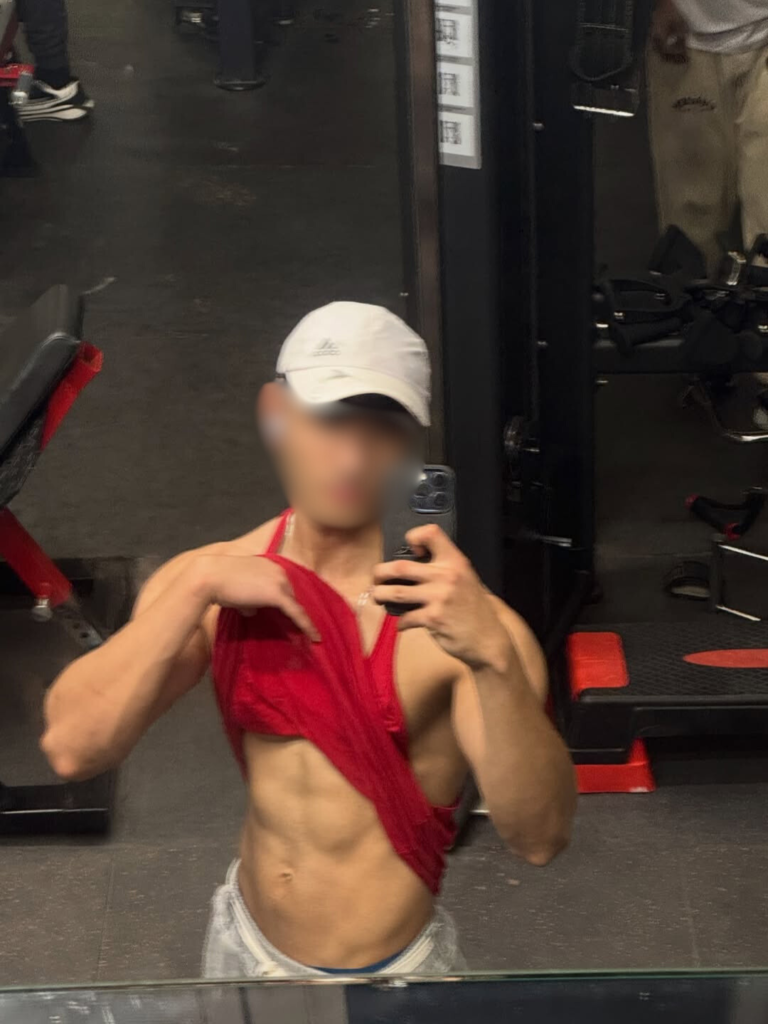 3. Fit and playful male escort profile image focused on discretion