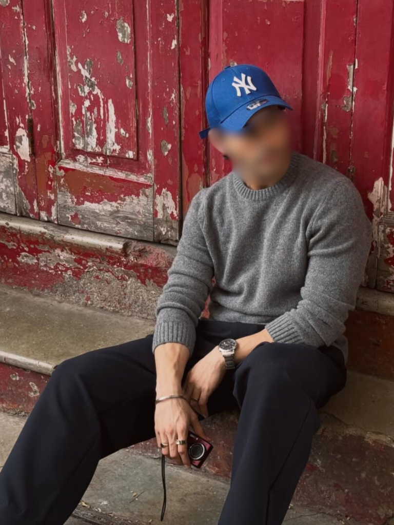 Tall and polished male escort profile image with refined presence