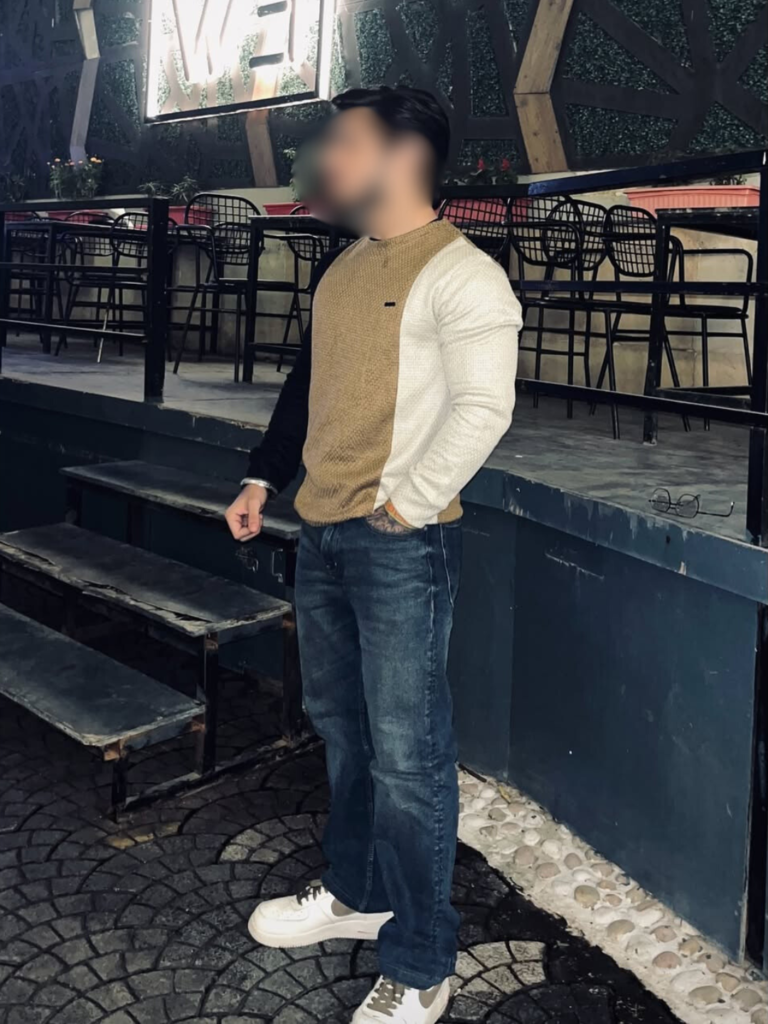 Party-savvy male escort profile image focused on discretion and comfort