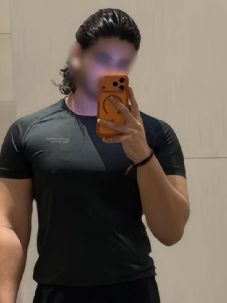 Gen-Z stylish male escort profile image focused on confidence