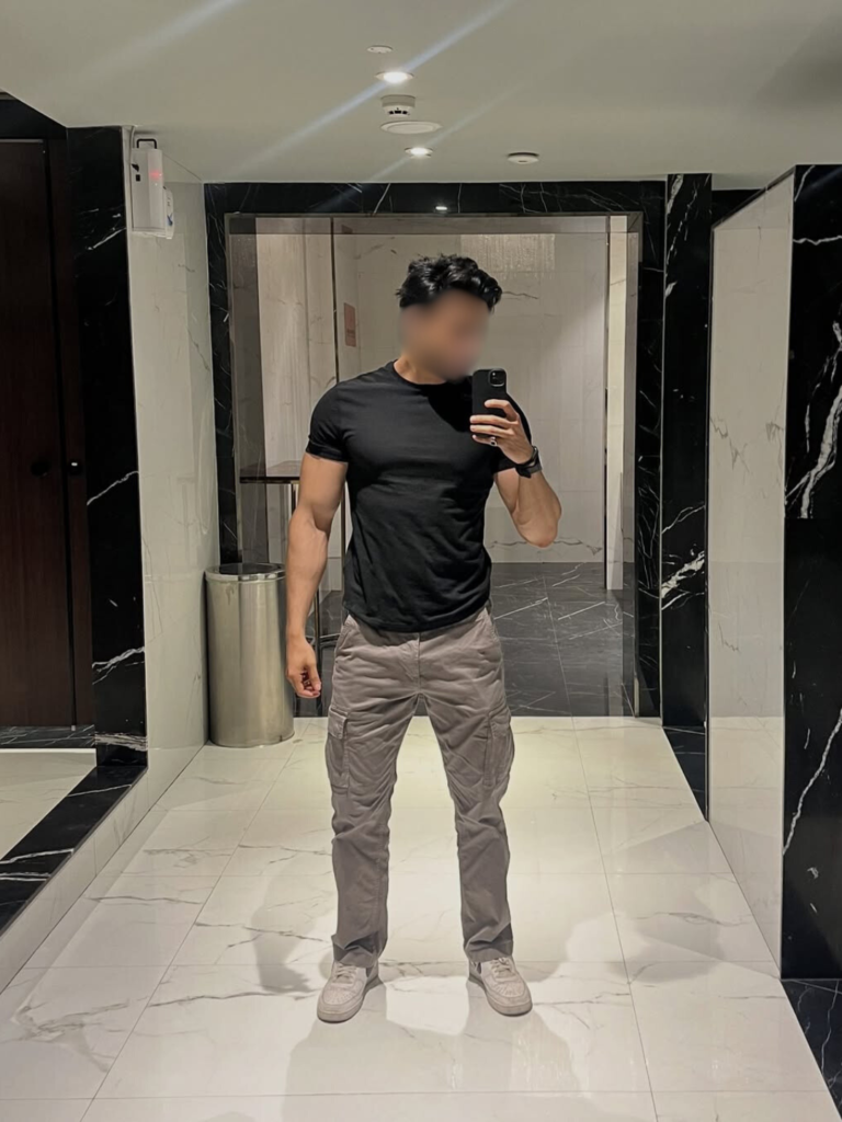 Tall professional male escort profile image with calm presence